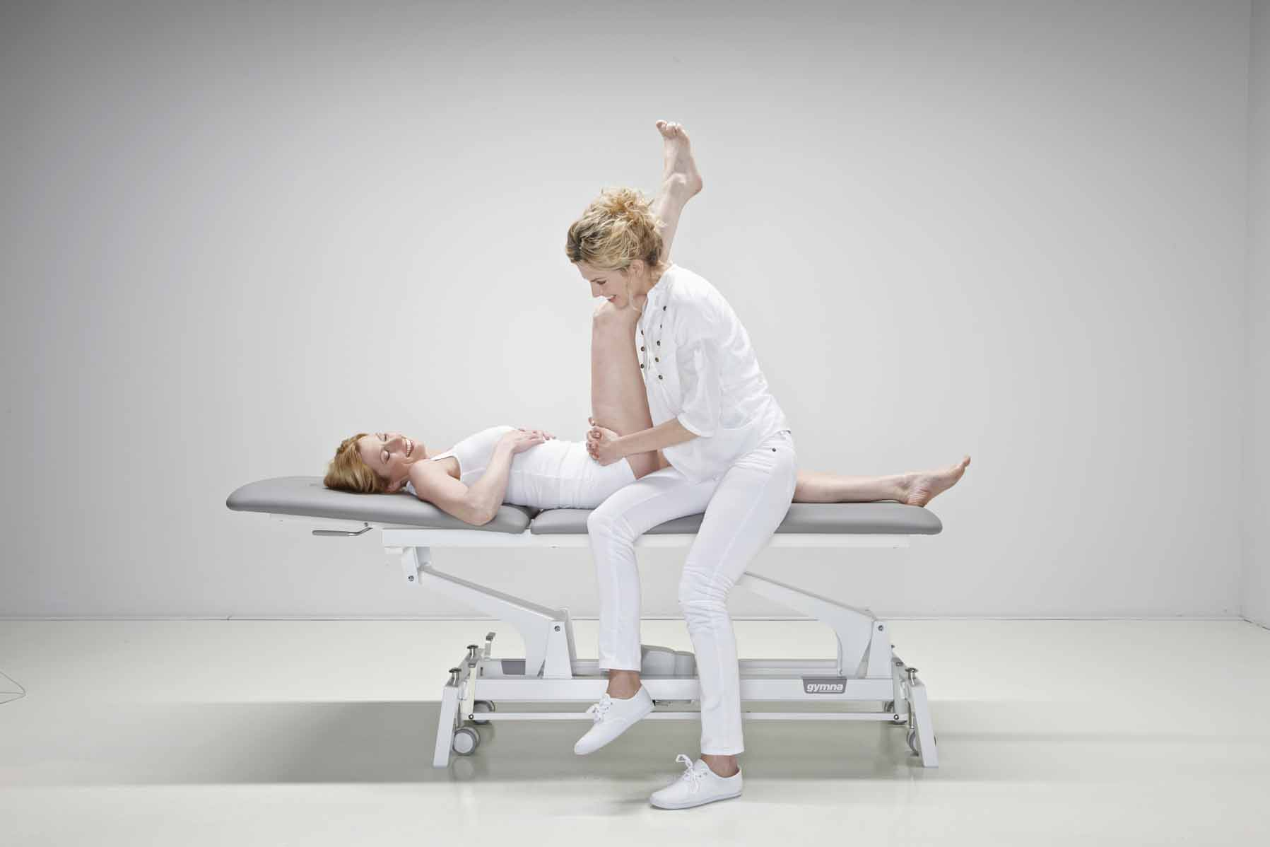 Behandlungsliege Gymna G2 Duo, elektrische Höhenverstellung - Artikel wurde ab dem 01. April durch Gymna.GO ersetzt! - Papierrollenhalter 50 cm