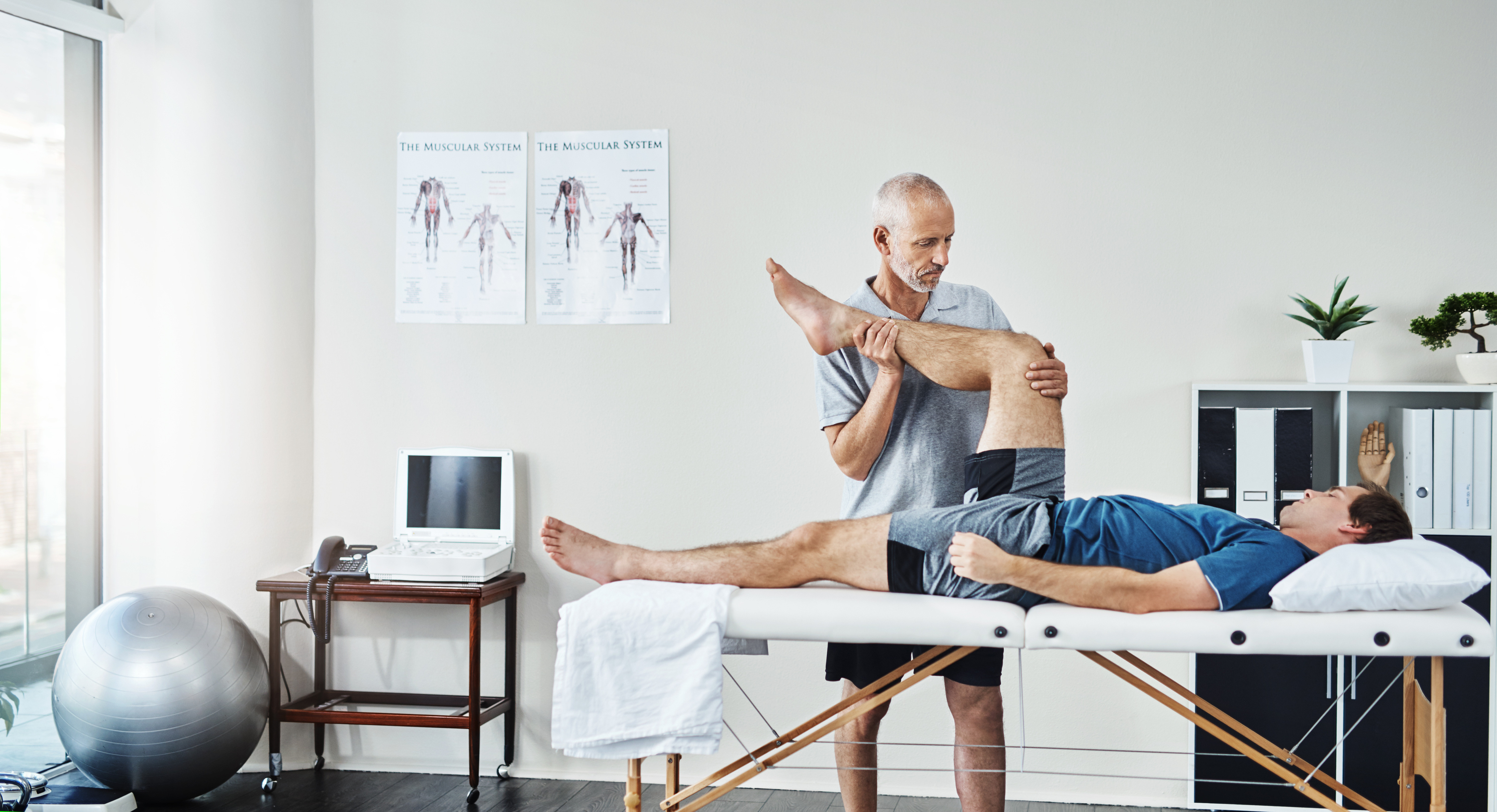 support-physiotherapist-patient-with-leg-injury-recovery-healthcare-wellness-male-person-client-chiropractor-with-skills-stretching-legs-consultation-physiotherapy-healing