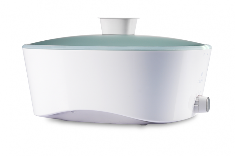 Caldera Wärmegerät, weiß mit Silikoneinsatz in silver blue